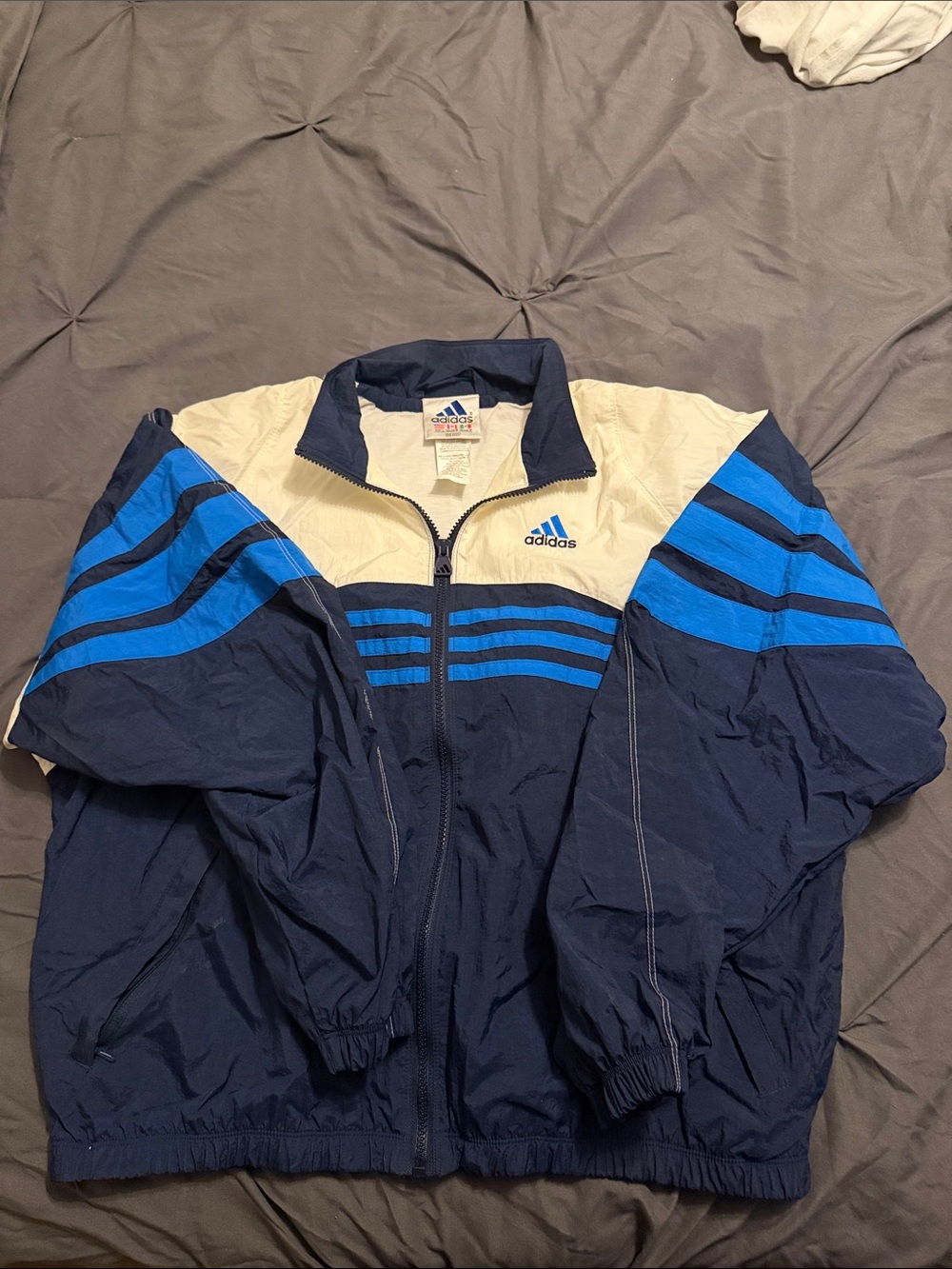 Vintage Adidas Men's Navy & Cream Windbreaker with Blue Accents